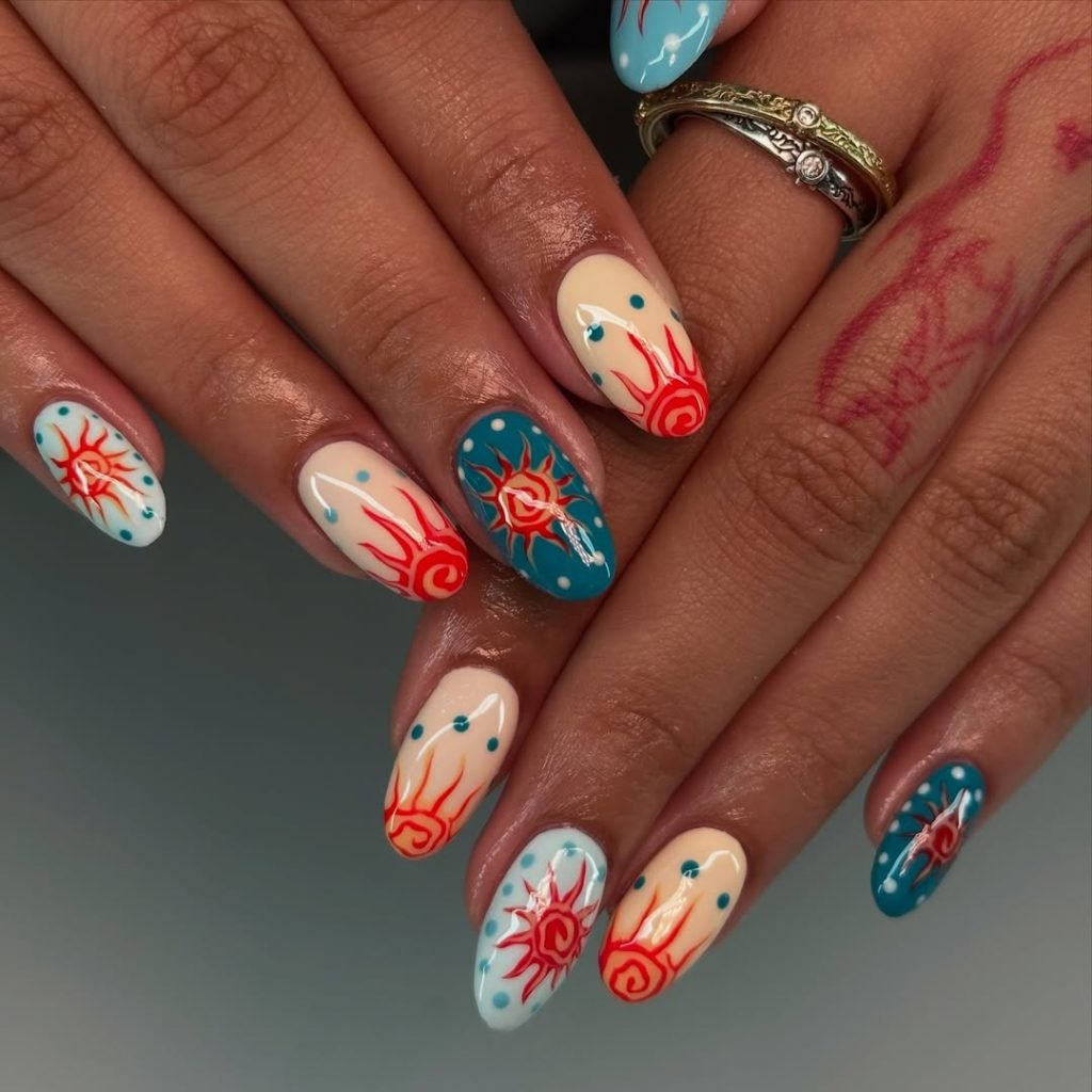 Southwestern inspired (Native American) nails on a white base with turquoise beads, copper line work, and feather details, styled like beadwork jewelry