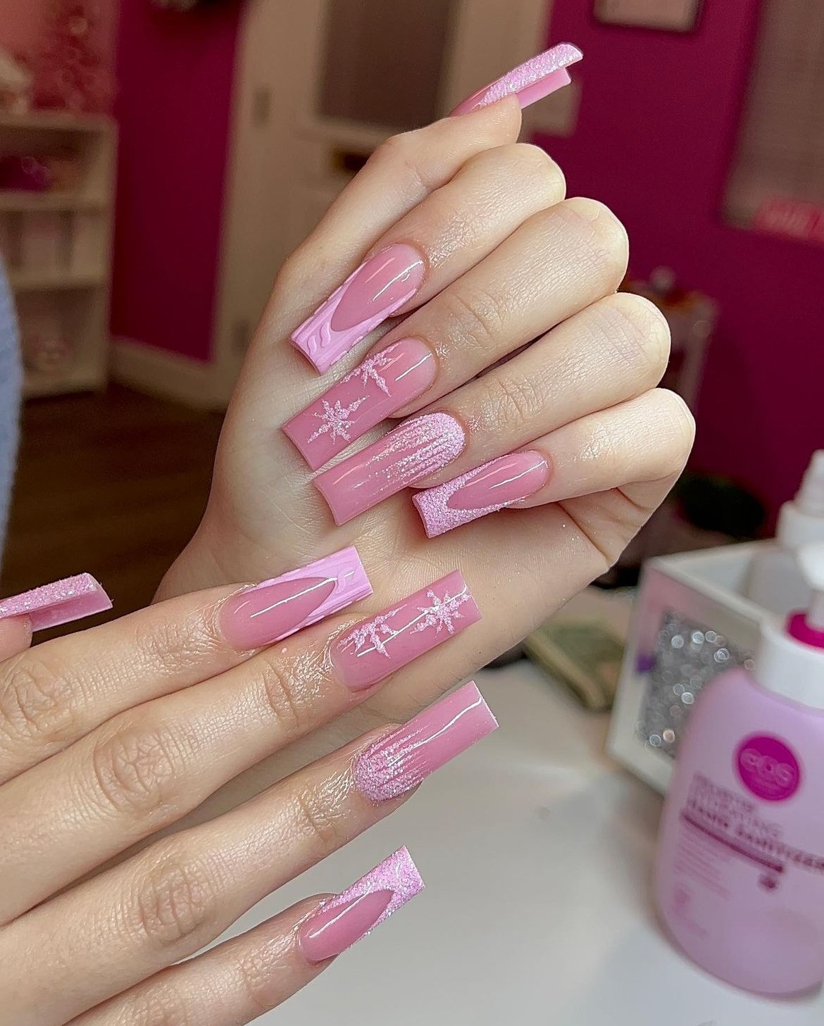 Pink nails with winter designs