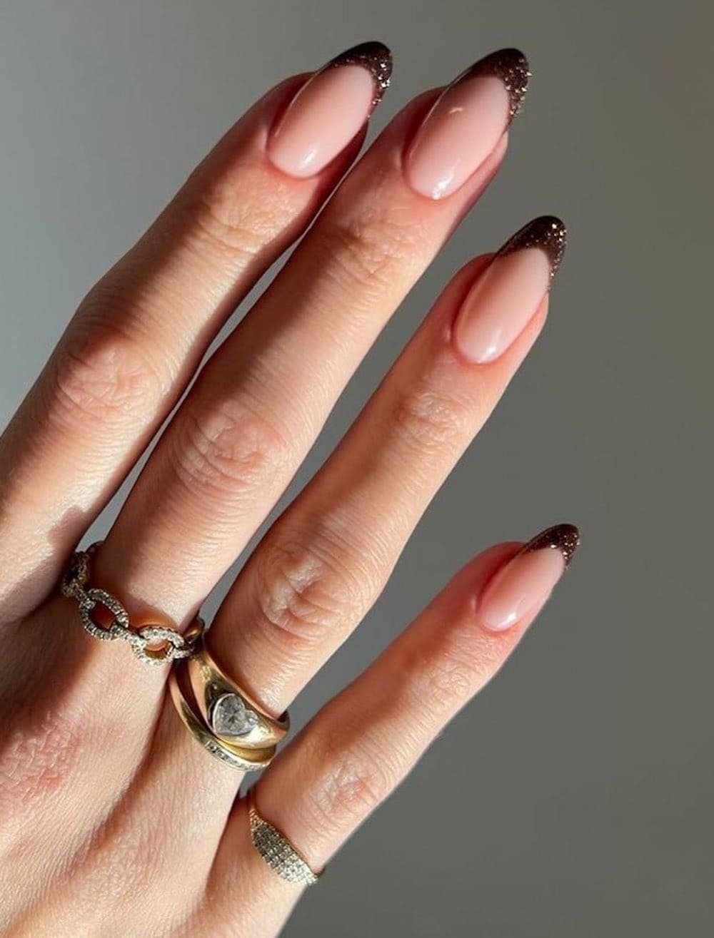 Elegant nails with brown tips.