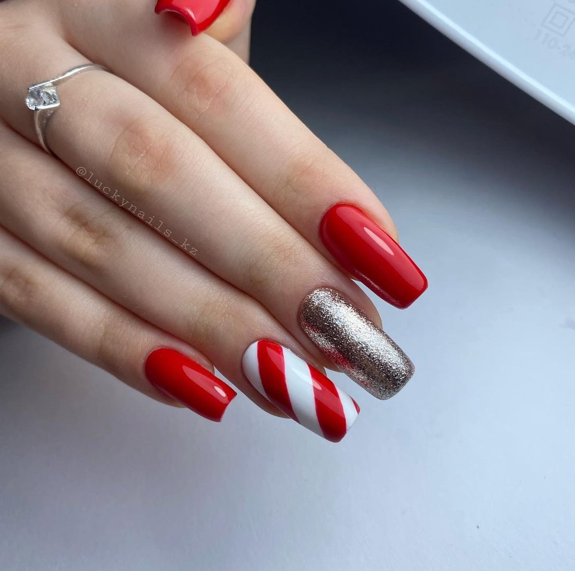 Red and white festive nail design