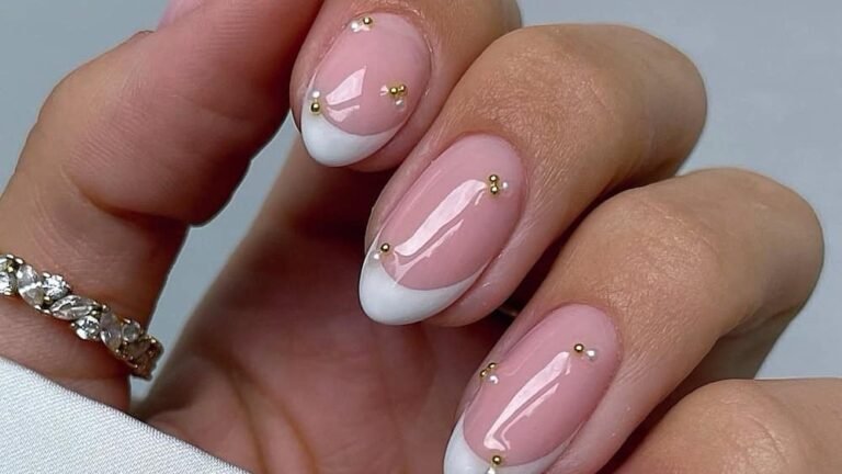 Nude nail with white French tip and tiny gold pearl dots, classy Christmas nail idea