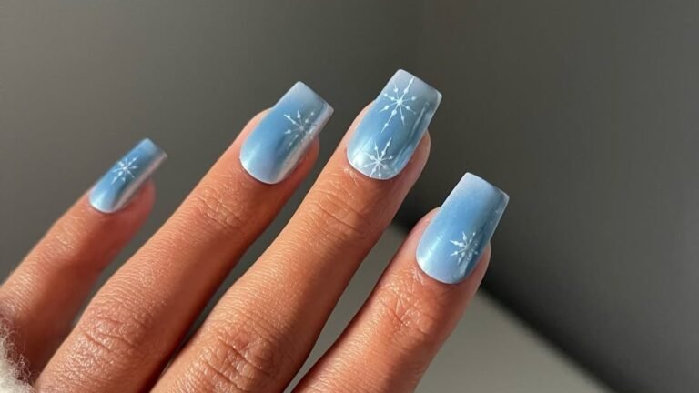 Blue ombre coffin nails with white snowflake nail art design for winter