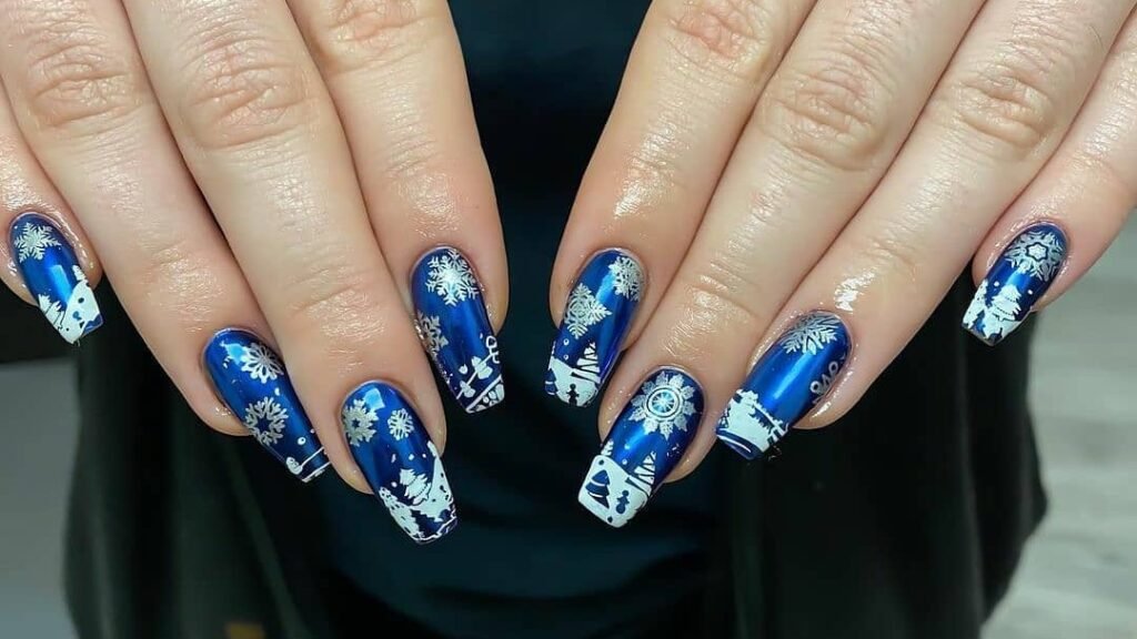 Navy blue chrome nails with white snowflake and winter village nail art on both hands
