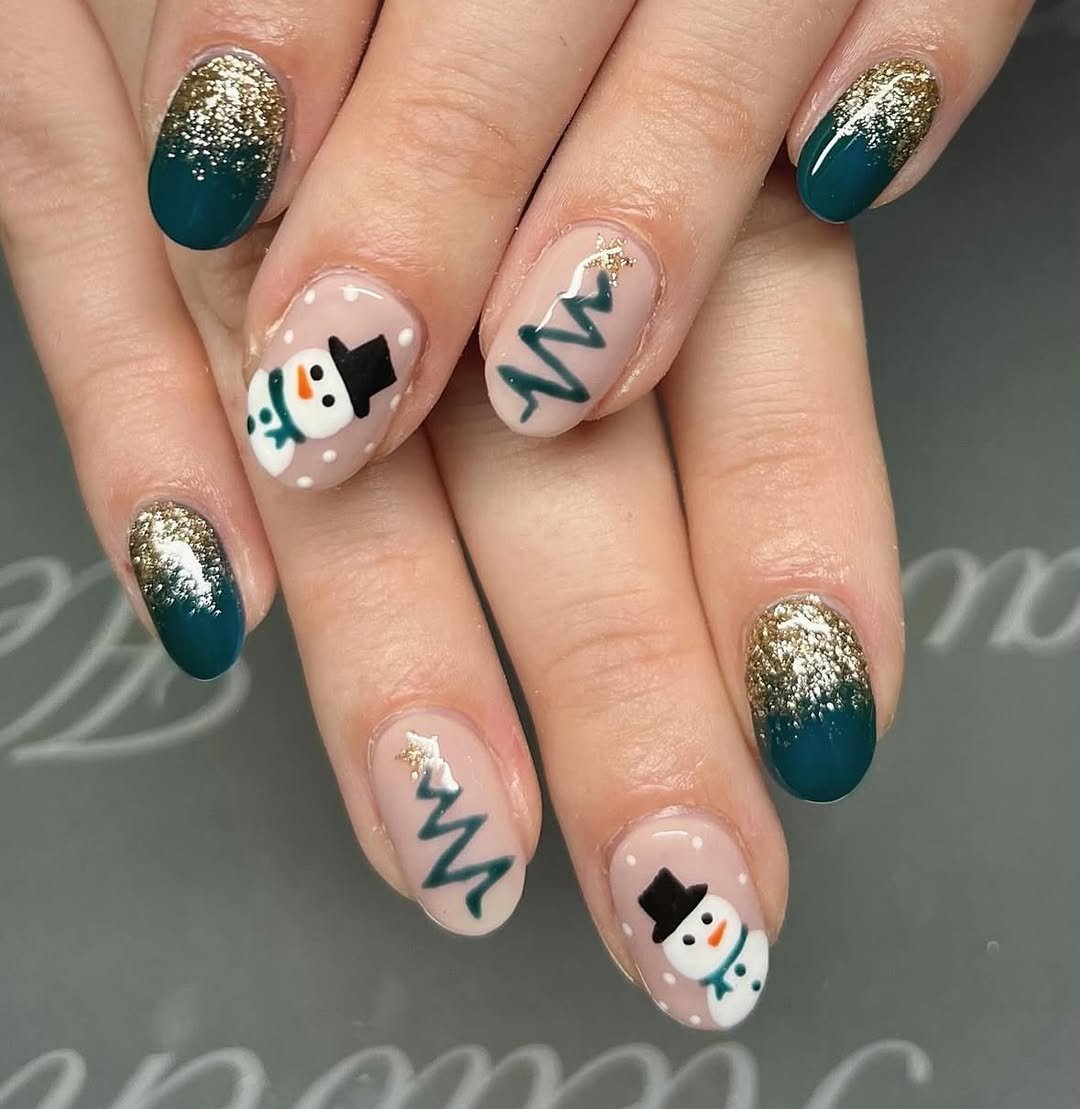 Festive snowman and glittery nails