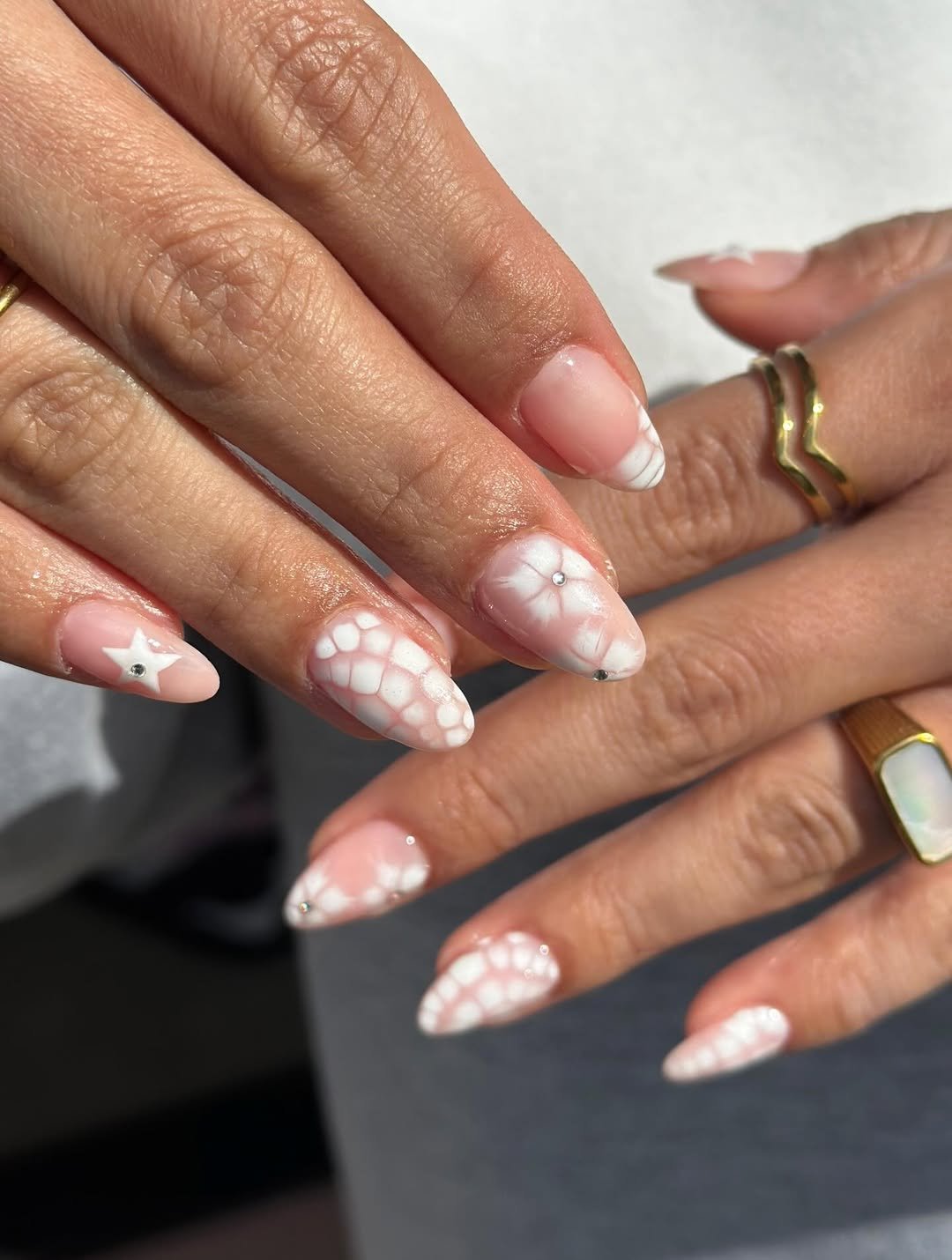 Elegant nail art with white designs