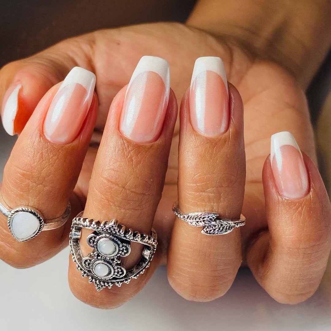 Elegant nails with stylish rings.