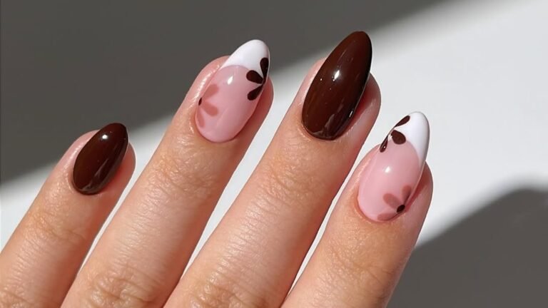 Chocolate brown nail set with glossy solid espresso nails and pink French tip nails featuring a chocolate heart accent