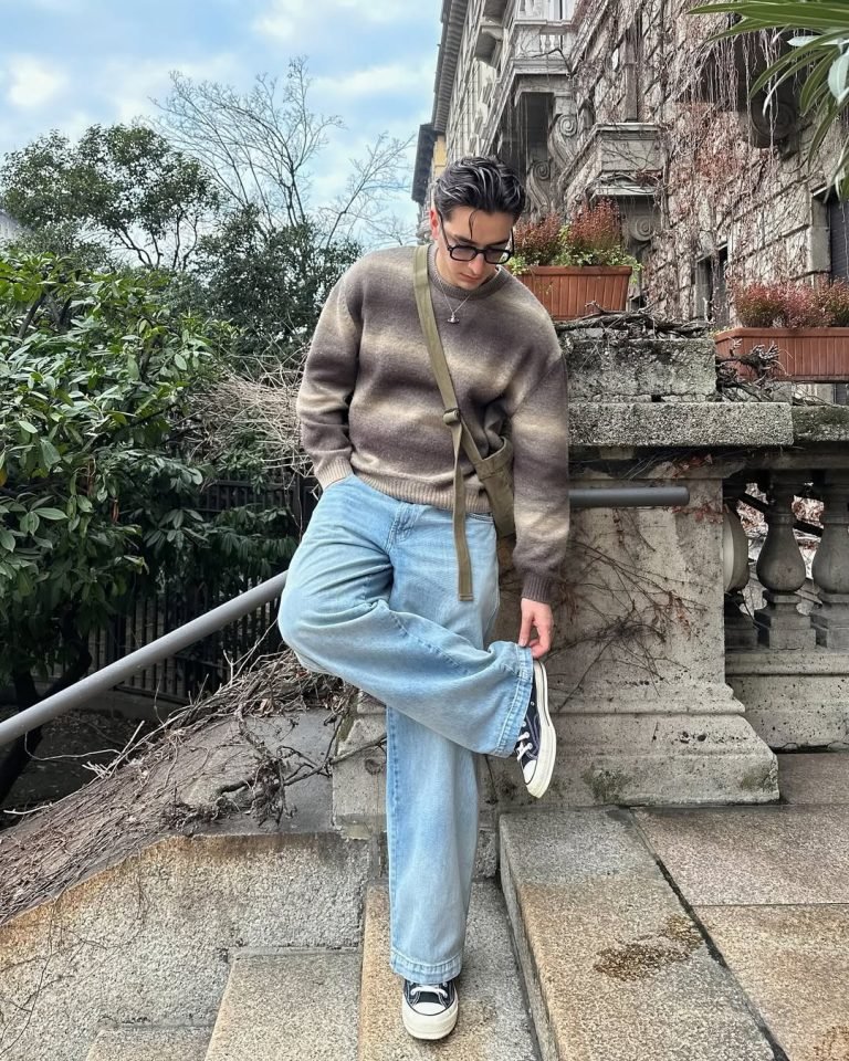 Person in casual outfit outdoors.