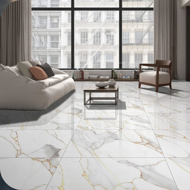 Living room with glossy gold-veined white Calacatta marble-look porcelain floor tiles, beige sofa and floor-to-ceiling windows