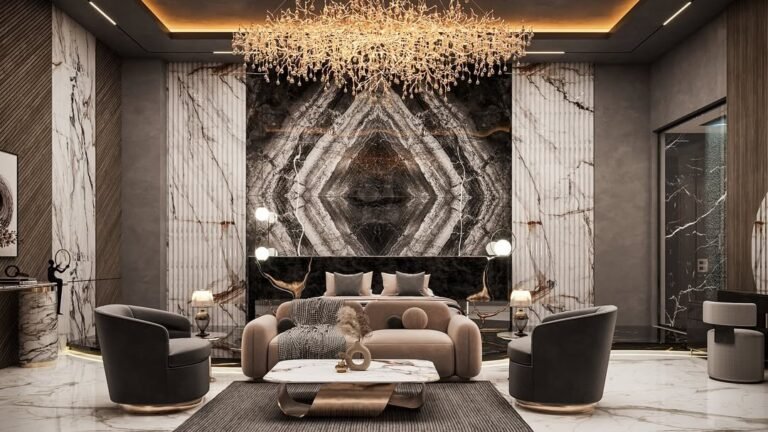 Living room with a bookmatched marble feature wall, a gold branch chandelier, and dark swivel accent chairs